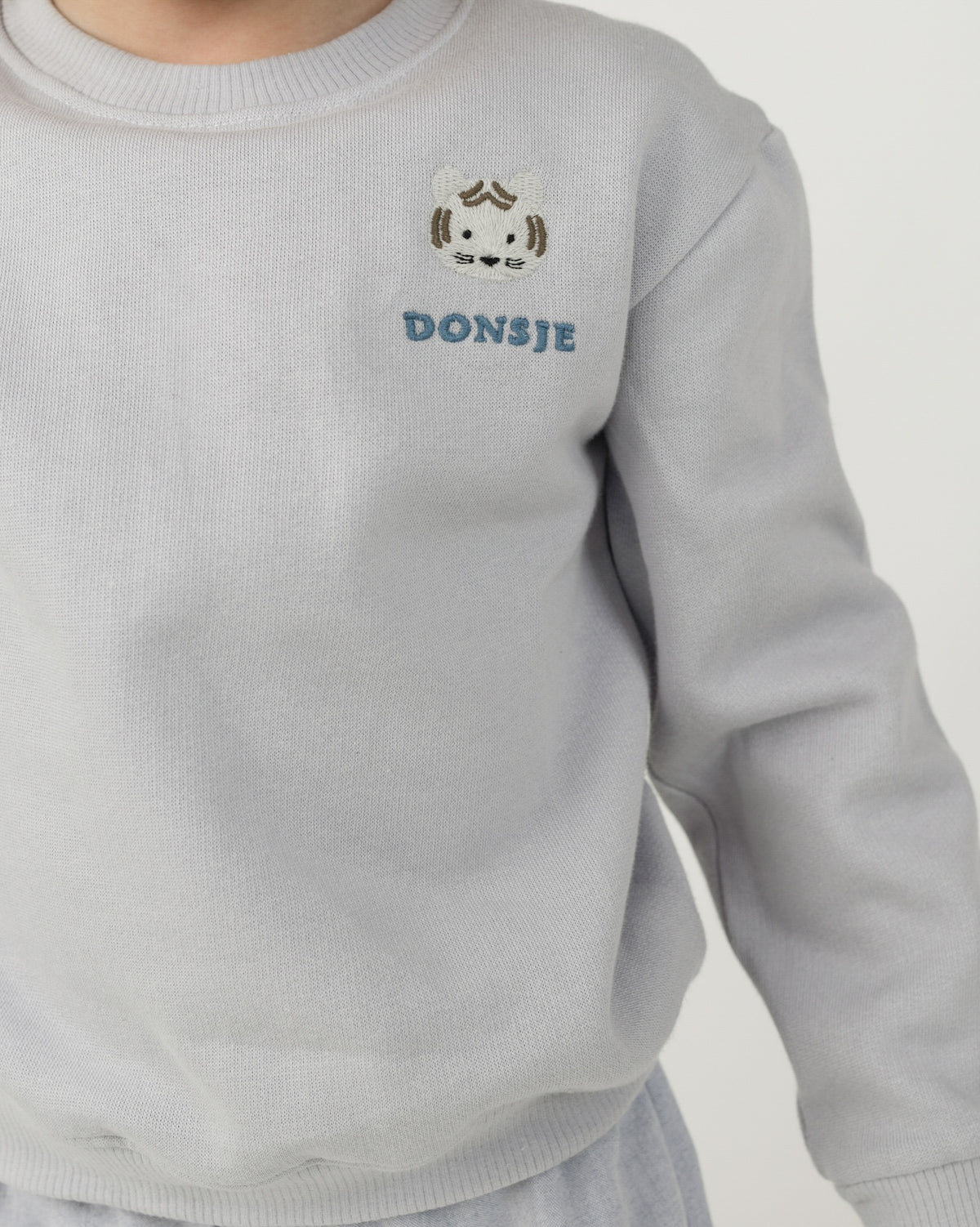 Muckie Sweater | White Tiger, Donsje Amsterdam