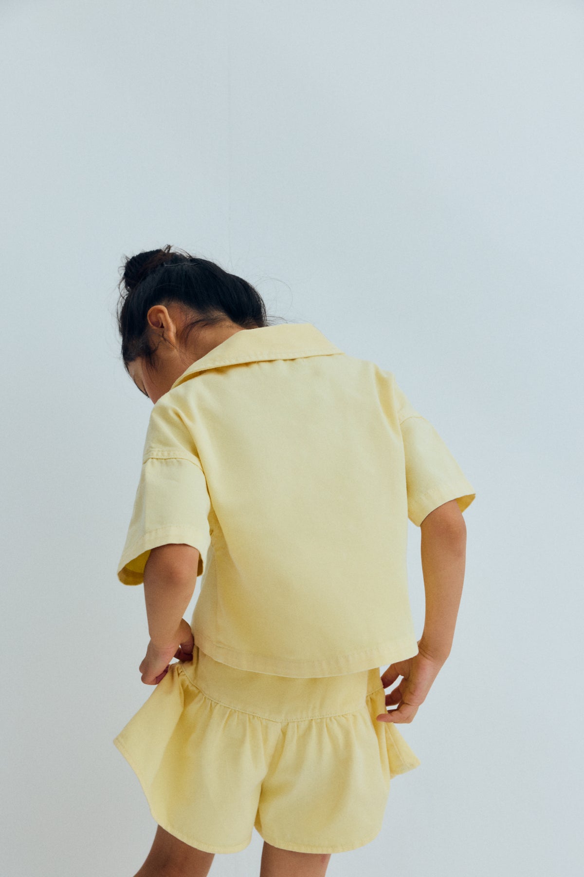 Bellis short Soft Lemon, The New Society